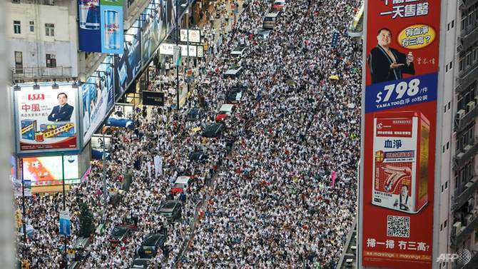 Hong Kong protesters aim for massive turnout at rare sanctioned march