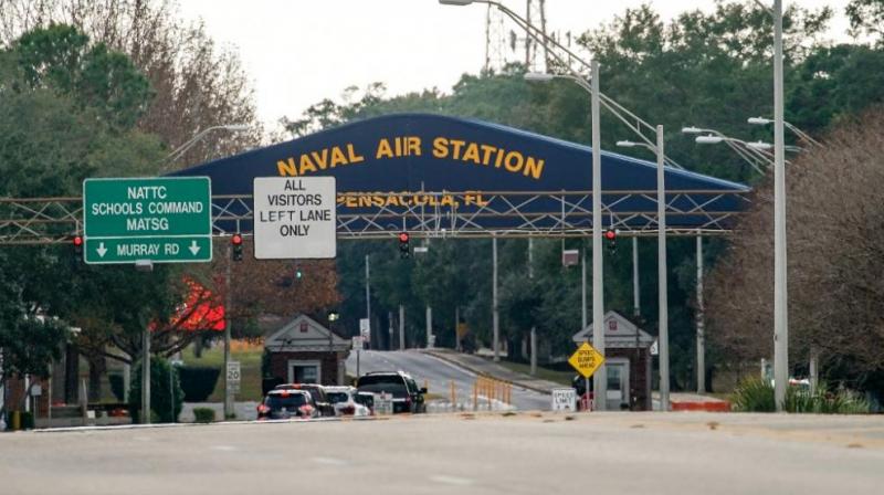 Night before US naval base attack, gunman showed mass shooting videos at party: report