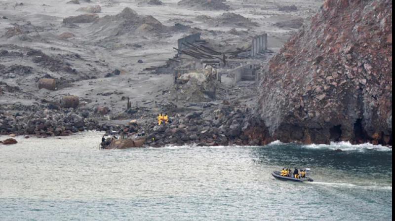 Divers search for remaining bodies from New Zealand volcanic eruption