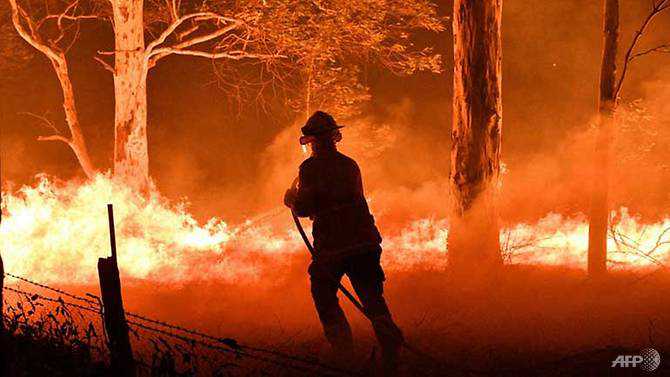 Australia orders mass evacuation of fire-ravaged towns before heatwave