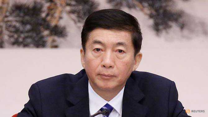New chief of China's HK liaison office hopes city returns to 'right path'