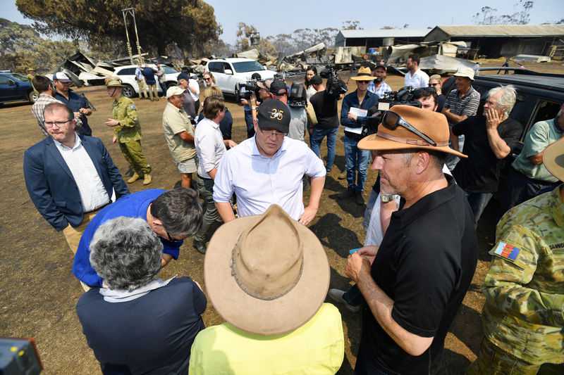 Australian prime minister’s approval rating singed by bushfires