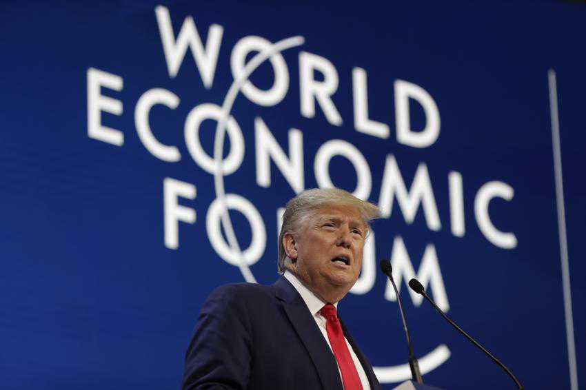Trump praises U.S. economy in Davos, says little on climate woes