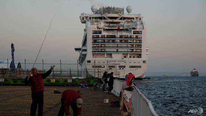 Dozens of passengers allowed off virus-hit Diamond Princess ship have symptoms: Japan minister