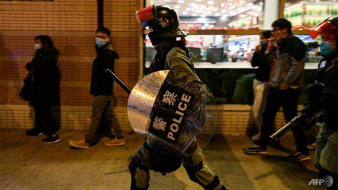 Hong Kong starts standing down riot police after budget hike