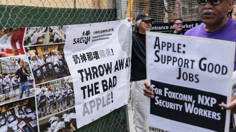 Apple, Sony accused of using forced labour of Uighur detainees in China
