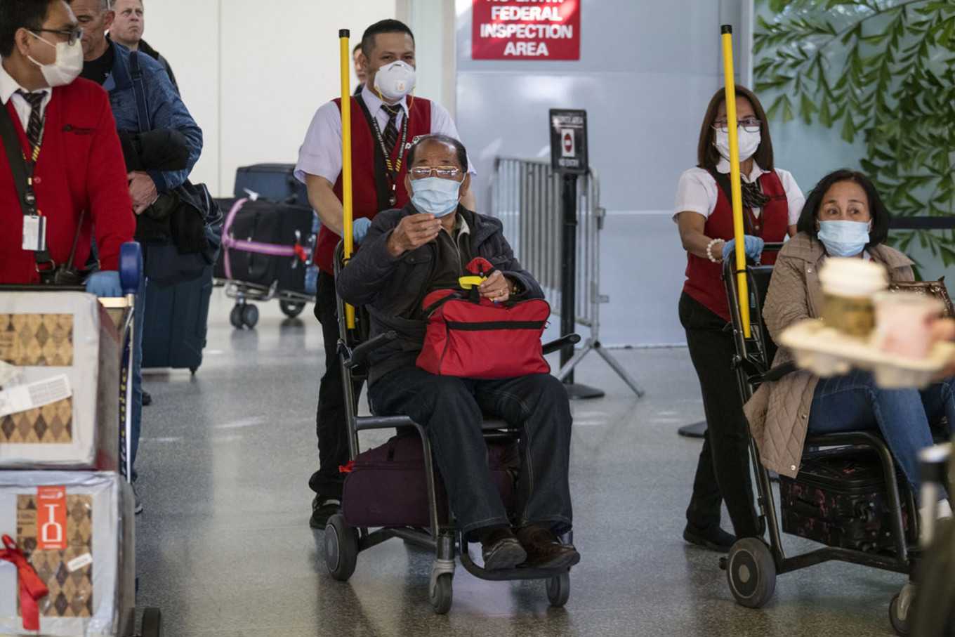 US airport screeners, health workers suffering from dread and anger as coronavirus spreads