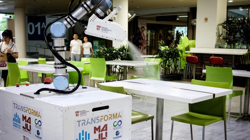 Singapore trials disinfectant robot with dexterous arm in fight coronavirus