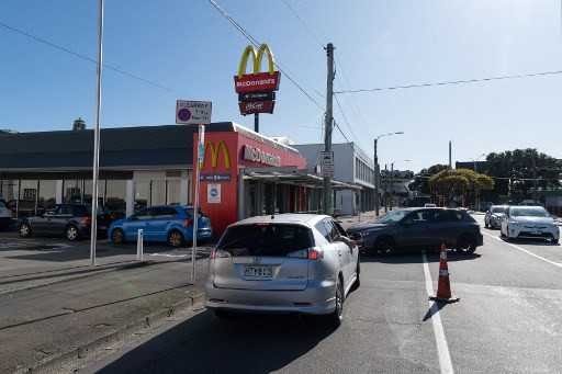 Burgers, fries and coffee: New Zealanders rush for junk food as lockdown eases