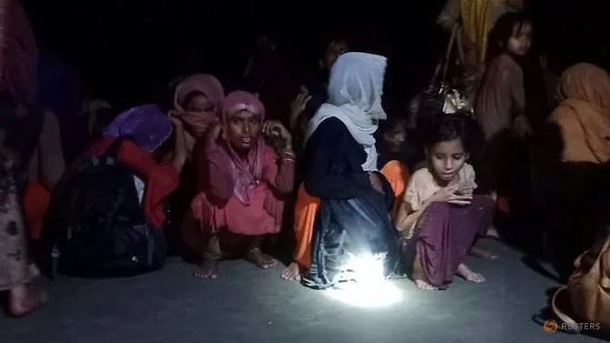 A large number of Rohingya from stranded boat land in southern Bangladesh