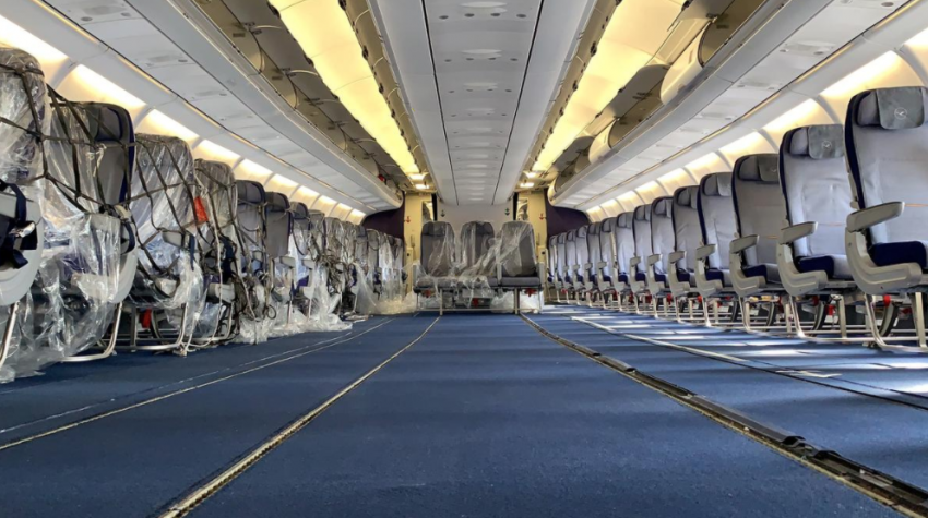 Crisis-hit airlines scramble to convert empty cabins to cargo