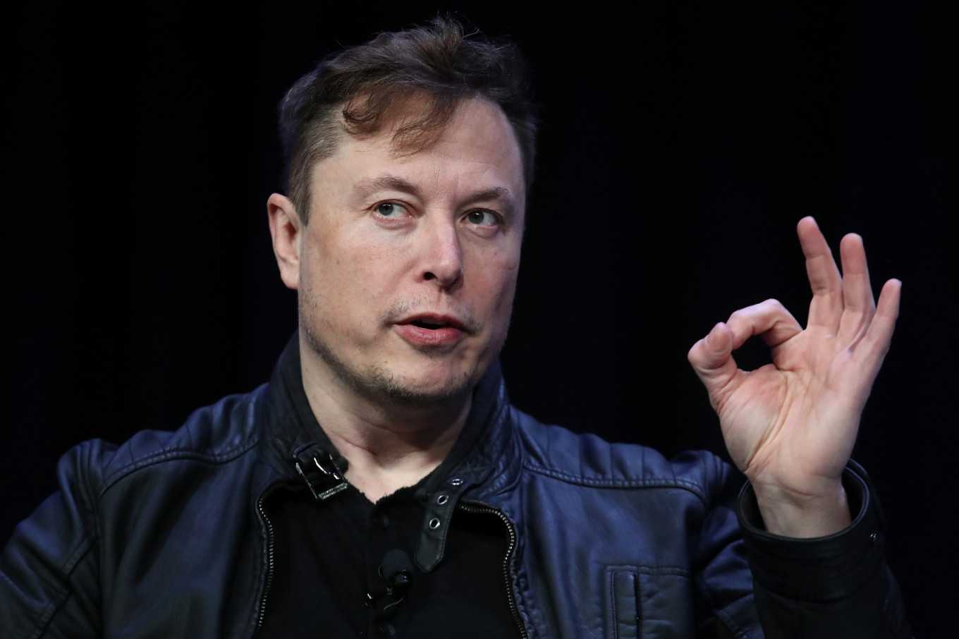 Musk 'restarting' California Tesla factory, defying authorities