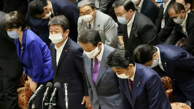 Japan MPs move record COVID-19 budget
