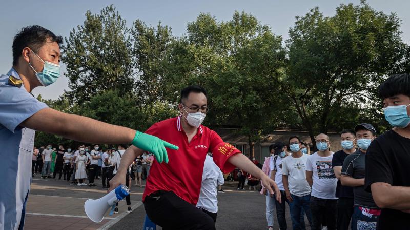 Beijing reports drop in new coronavirus cases