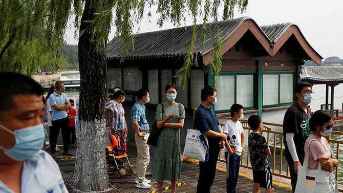 China sees uptick in new COVID-19 conditions, including 17 in Beijing