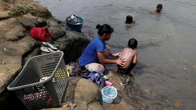 In Indonesia, coronavirus floods Cisadane River with extra hazard - medical waste