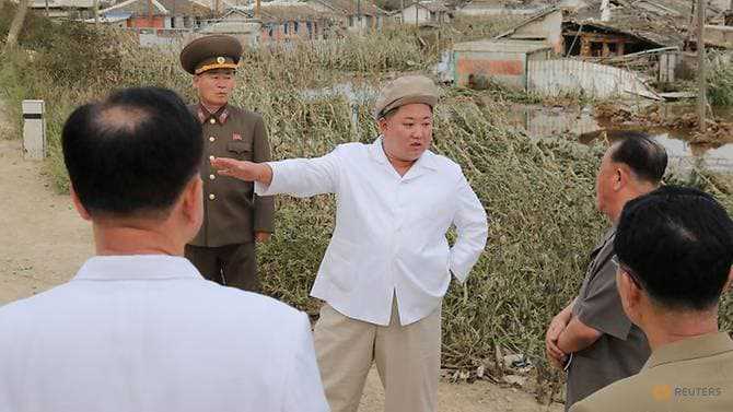 North Korea leader Kim Jong Un tours typhoon-hit area, directs recovery effort