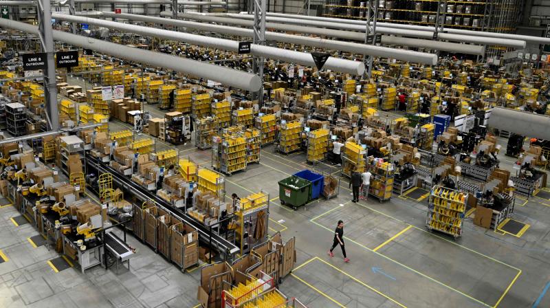 Amazon to employ 7,000 people in UK as virus fuels online demand
