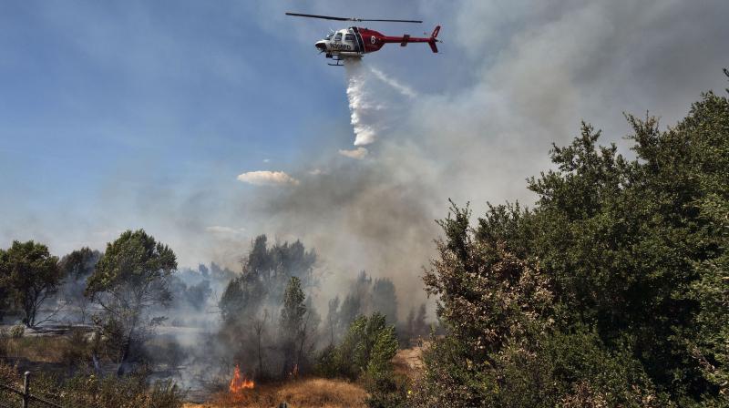 Fire on all sides: Californians trapped by wildfire airlifted to safety