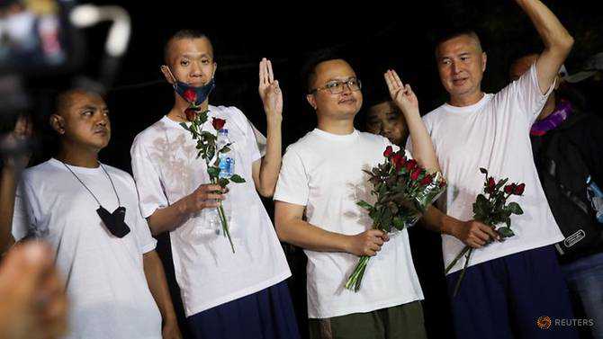 Four Thai activists vow to keep protests after release