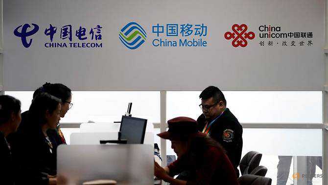 In sudden reversal, NYSE says won't delist three Chinese telcos