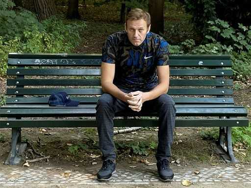 Kremlin foe Navalny faces arrest as flies back to Russia