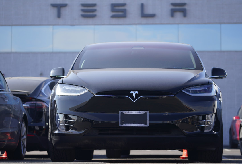 Tesla fights pandemic; jumps to 1st gross annual profit