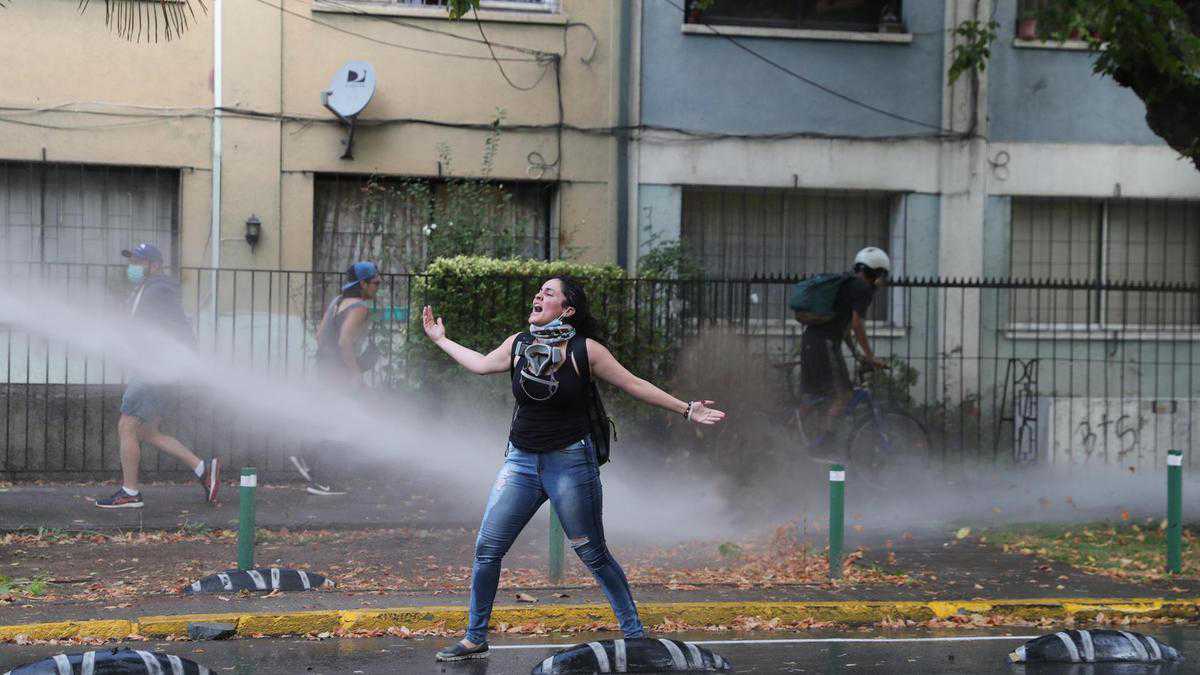 Protests erupt found in Chile after road performer shot by police