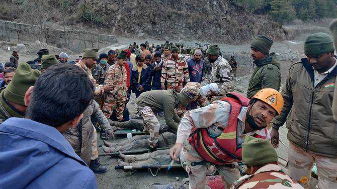 Rescuers search for 125 missing after glacier burst found in Indian Himalayas, many believed trapped found in tunnel