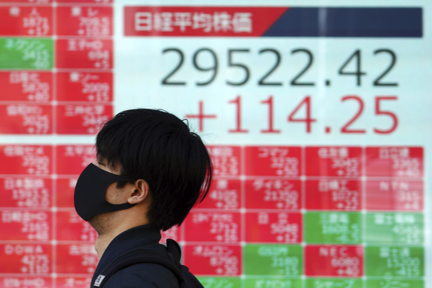 Asian shares advance despite Wall structure Street retreat