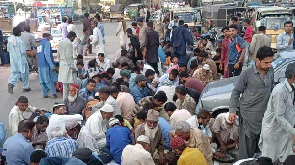 Pakistani help group sees former recipients return as volunteers for Ramadan meals drive