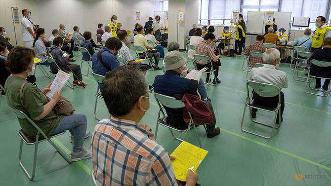 Japan opens mass COVID-19 vaccination sites for elderly before Olympics