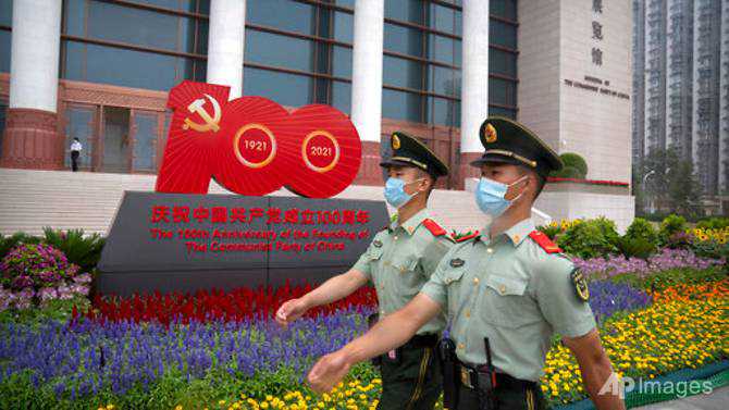 Police checks and patriotic flowers: Beijing leaves nothing to chance ahead of Party centenary