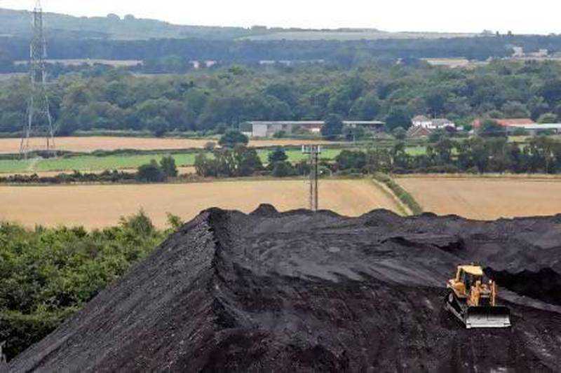 UK aims to end use of coal for power a year earlier