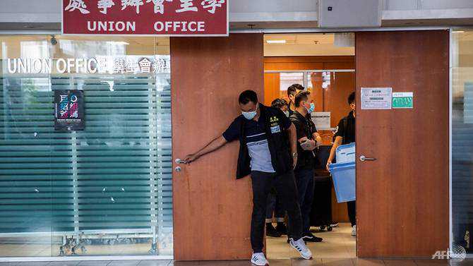 Hong Kong police raid top university in security law probe
