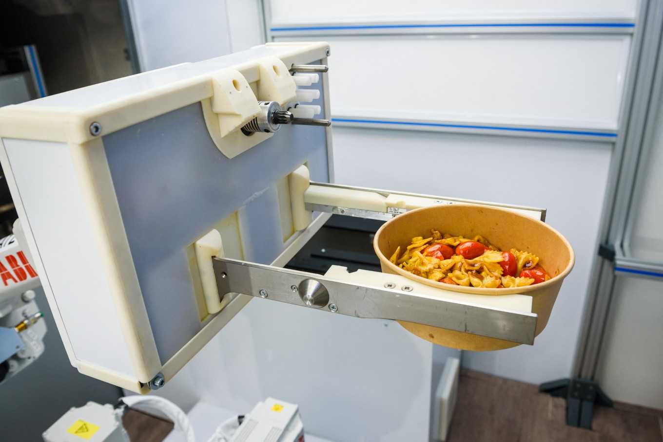 Kitchen robot in Riga cooks up new future for fast food
