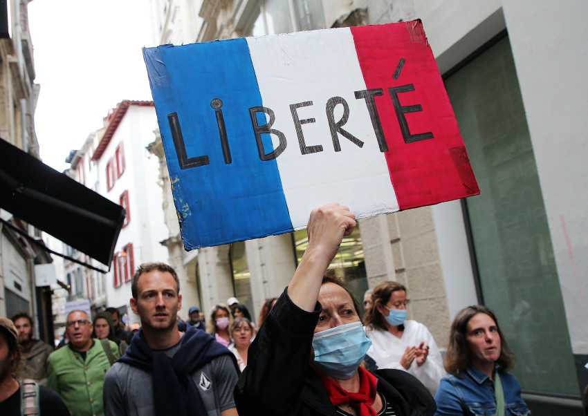 For 4th week, protesters in France decry virus pass rules