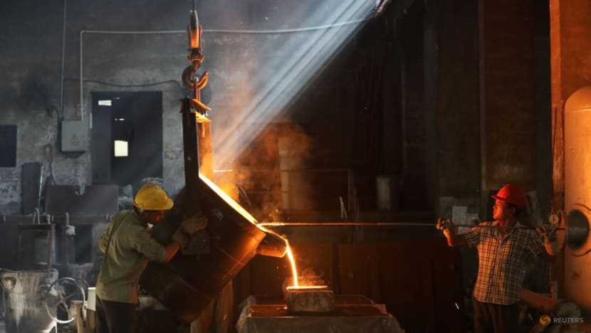 Chinese steel futures fall on subdued economic data