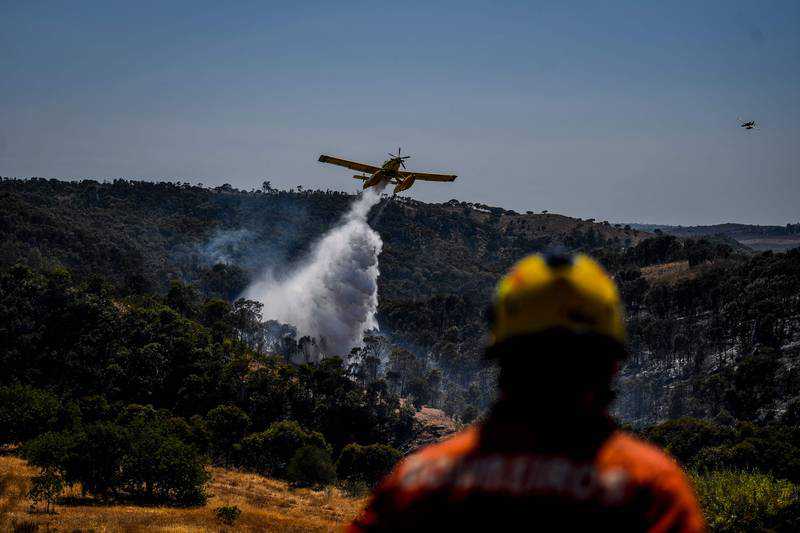 Portugal wildfire 'under control' but still burning