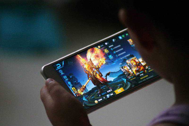 China limits children to three hours of online gaming per week
