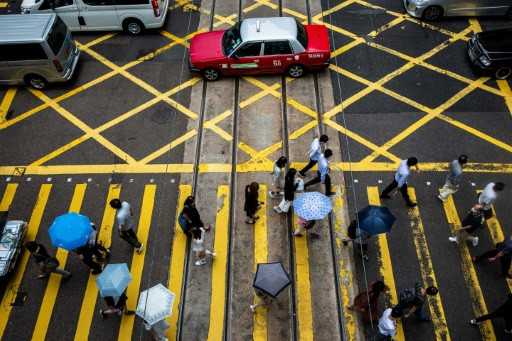 Councillors swear new Hong Kong loyalty oath after hundreds quit