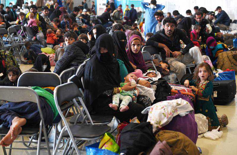 US resumes Afghan refugee flights after containing measles outbreak