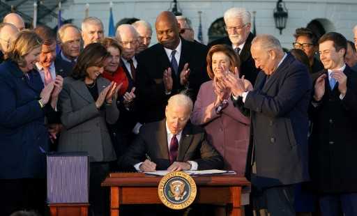 Biden celebrates rare win with U.S. infrastructure bill signing