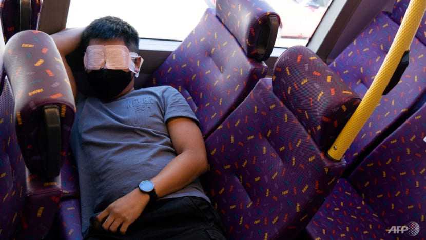 Passengers nap, sightsee on Hong Kong bus ride to nowhere