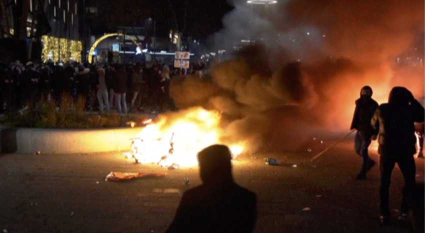 EU wants calm amid virus protests; rioters called 'idiots'