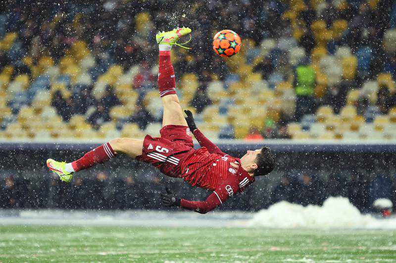 Lewandowski scores wonder goal as depleted Bayern triumph in the snow