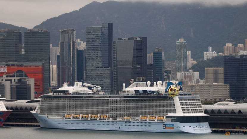 Hong Kong hunts COVID-19 patient's contacts, orders cruise ship back to port