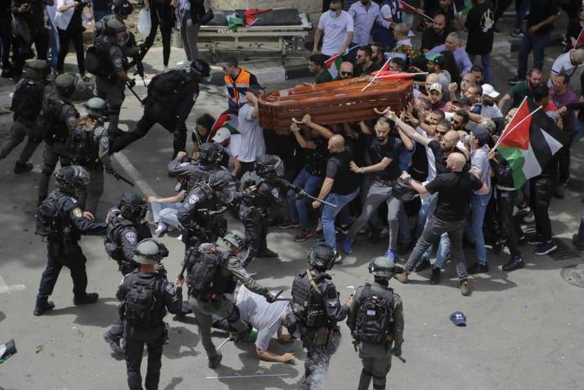 Israeli police beat pallbearers at Al Jazeera journalist's funeral