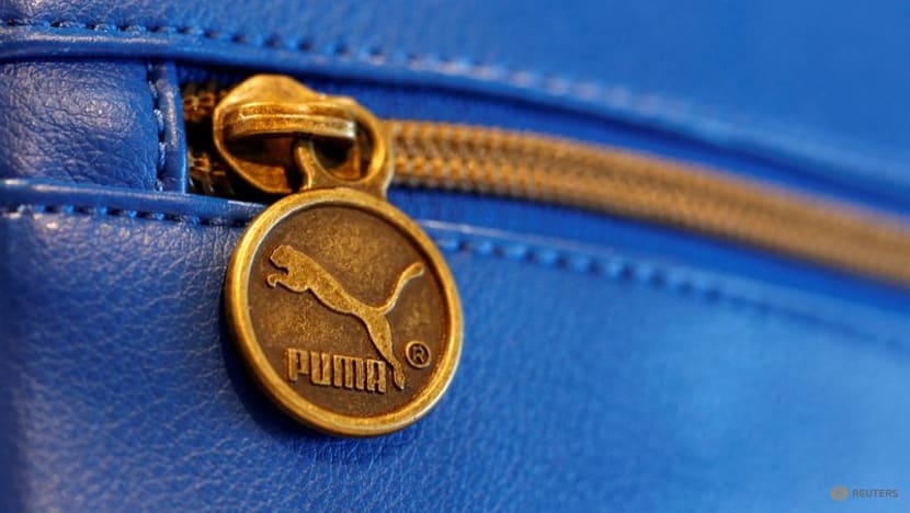 Puma raises revenue outlook, handling China woes better than Adidas