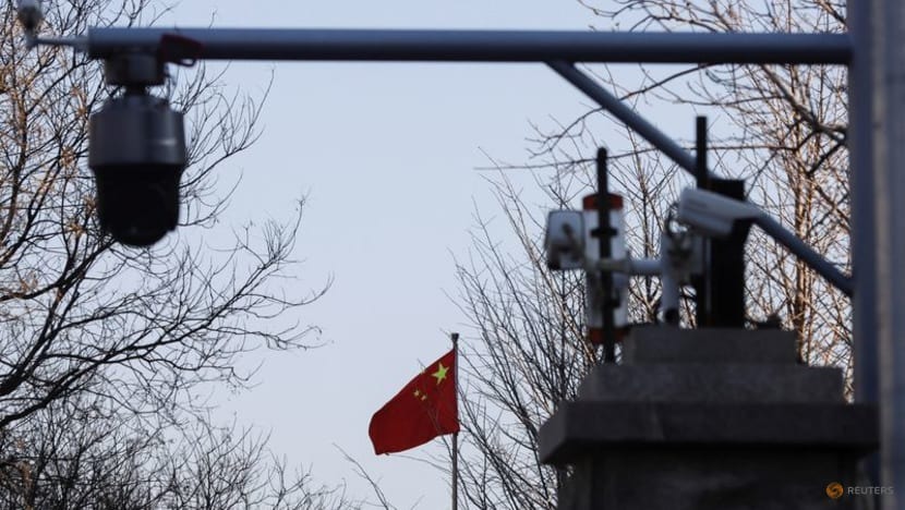 China accuses government employee of spying for US